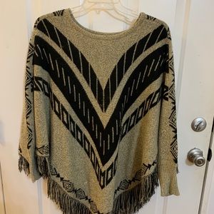 Tan and black poncho O/S